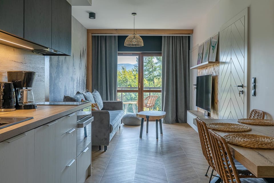 Kitchen or kitchenette, Living room, Seating area, Dining area