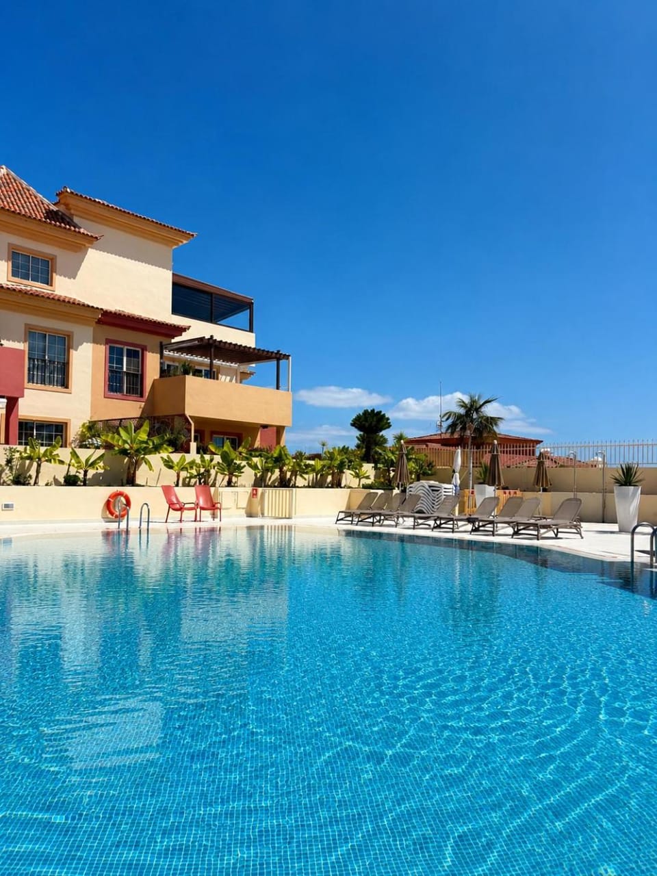 Property building, Day, Natural landscape, Pool view, Swimming pool, sunbed