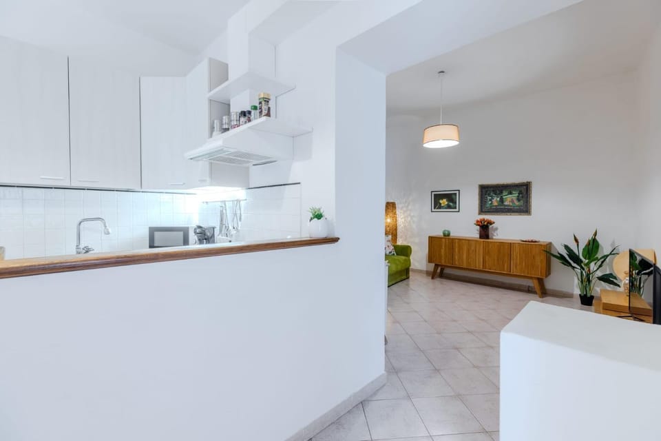 TV and multimedia, Kitchen or kitchenette, Living room, Seating area, oven, stove, kitchen