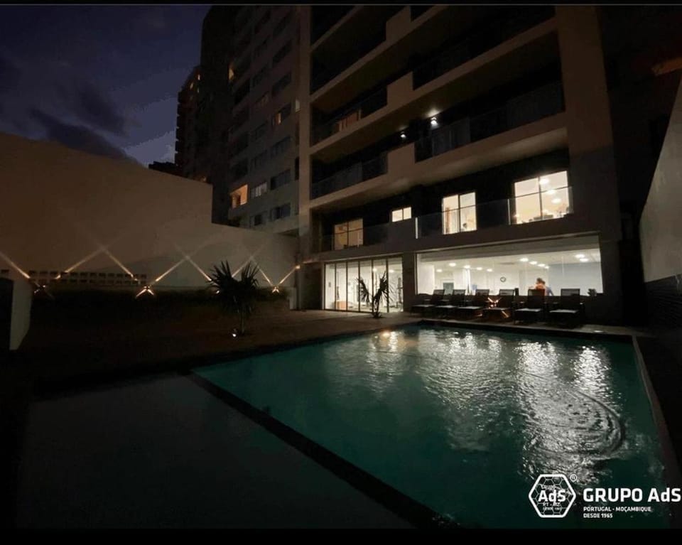 Swimming pool, sunbed