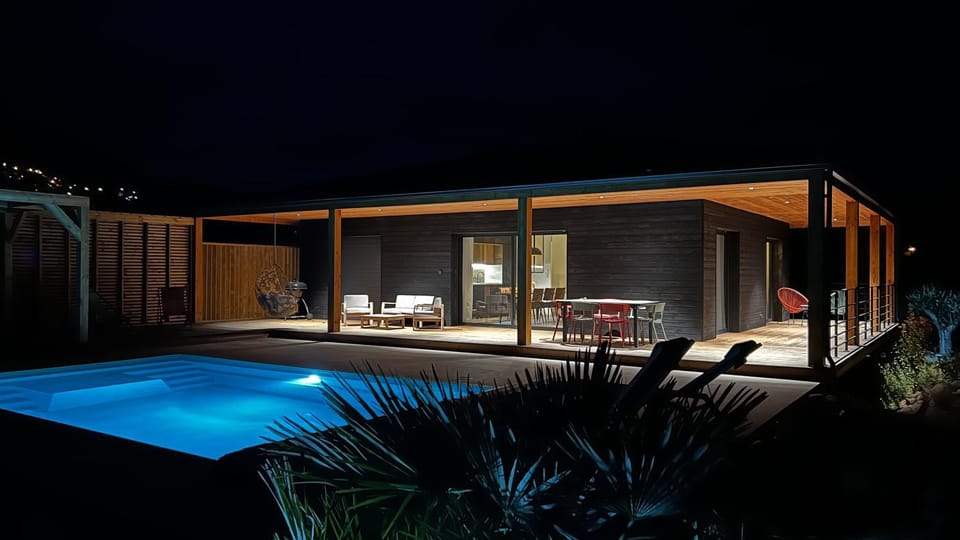 Property building, Patio, Night, Summer, Pool view, Swimming pool, sunbed