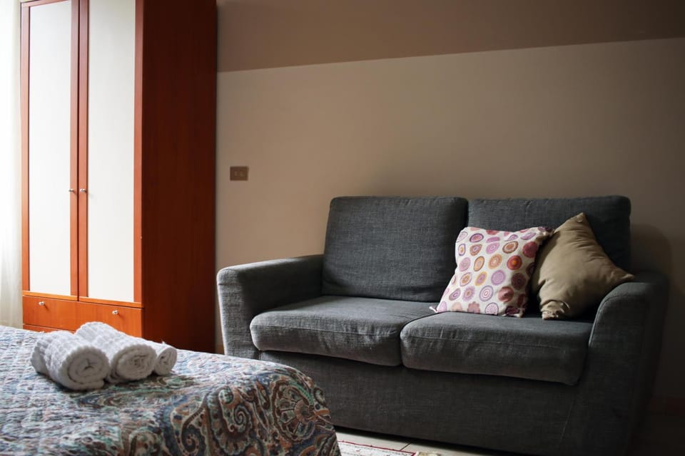 Bed, Photo of the whole room, microwave, towels, wardrobe