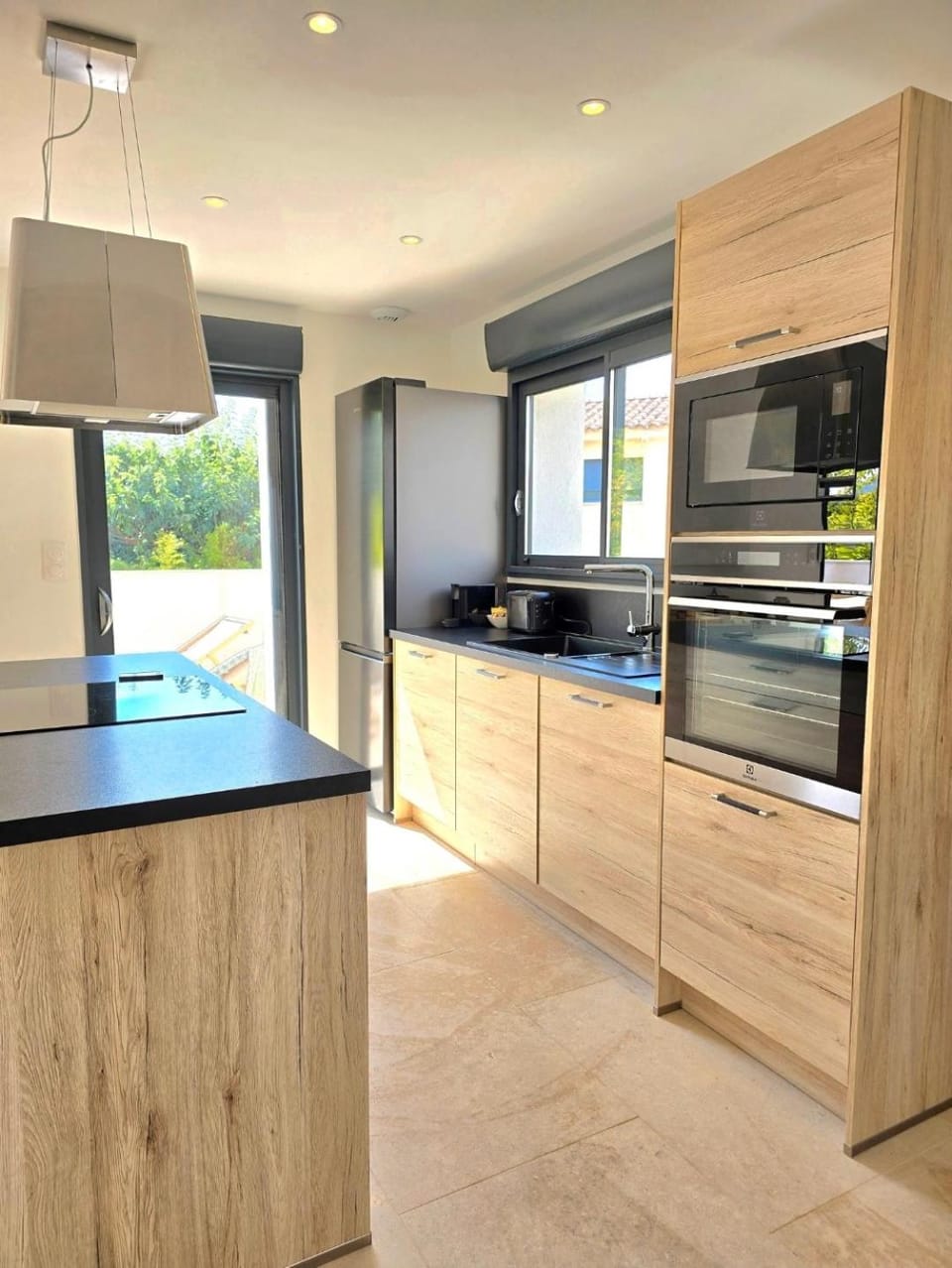 Kitchen or kitchenette, dishwasher, oven, stove