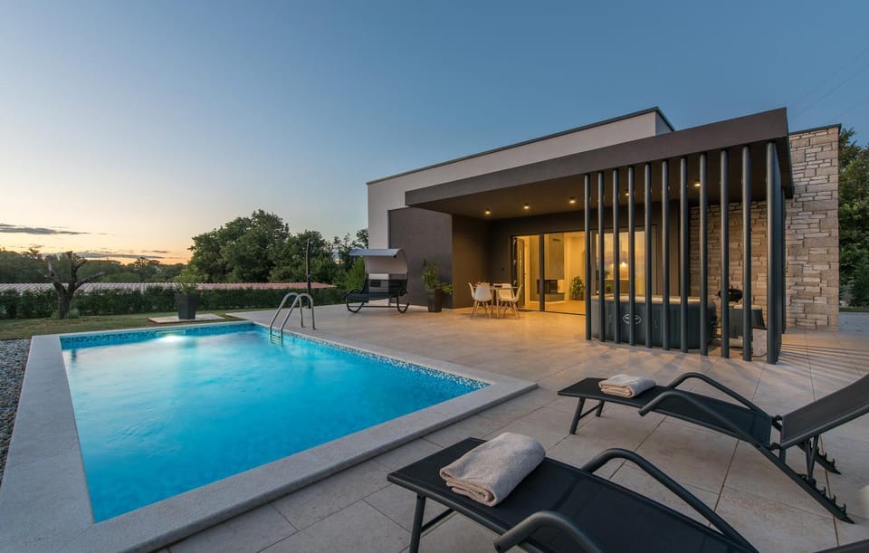 Property building, Patio, Natural landscape, Pool view, Swimming pool, Sunset, sunbed