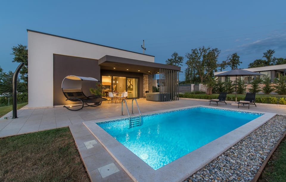 Property building, Natural landscape, Pool view, Swimming pool, Sunset, sunbed