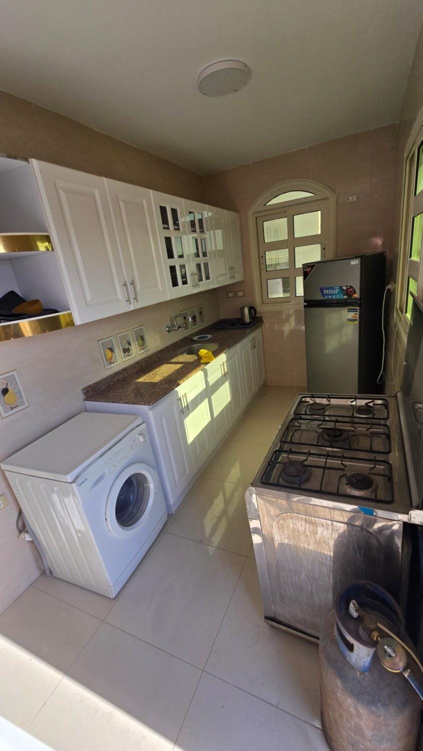 Kitchen or kitchenette, oven, stove