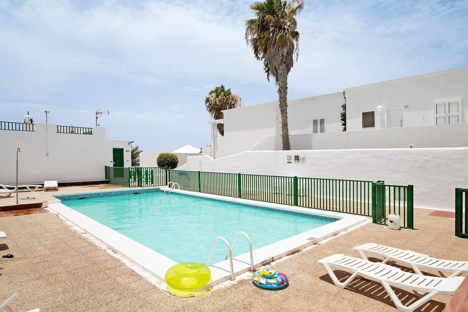 Property building, Living room, Swimming pool