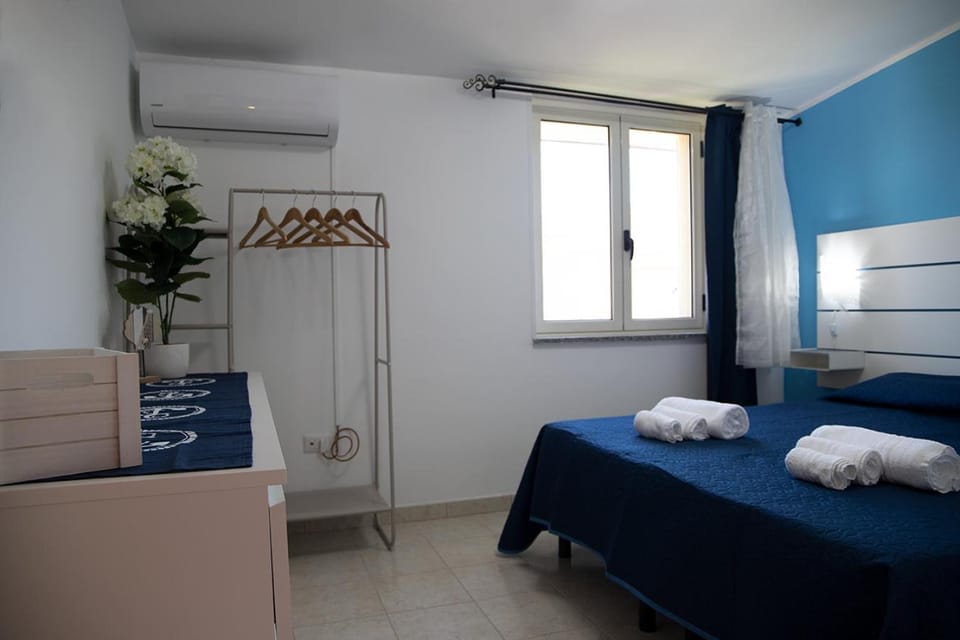 Bed, Photo of the whole room, Bedroom, bunk bed, towels, wardrobe, air conditioner