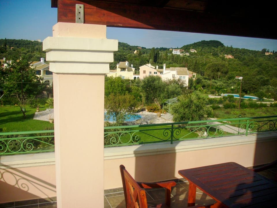Property building, Patio, Day, Natural landscape, View (from property/room), Balcony/Terrace, Pool view, Swimming pool