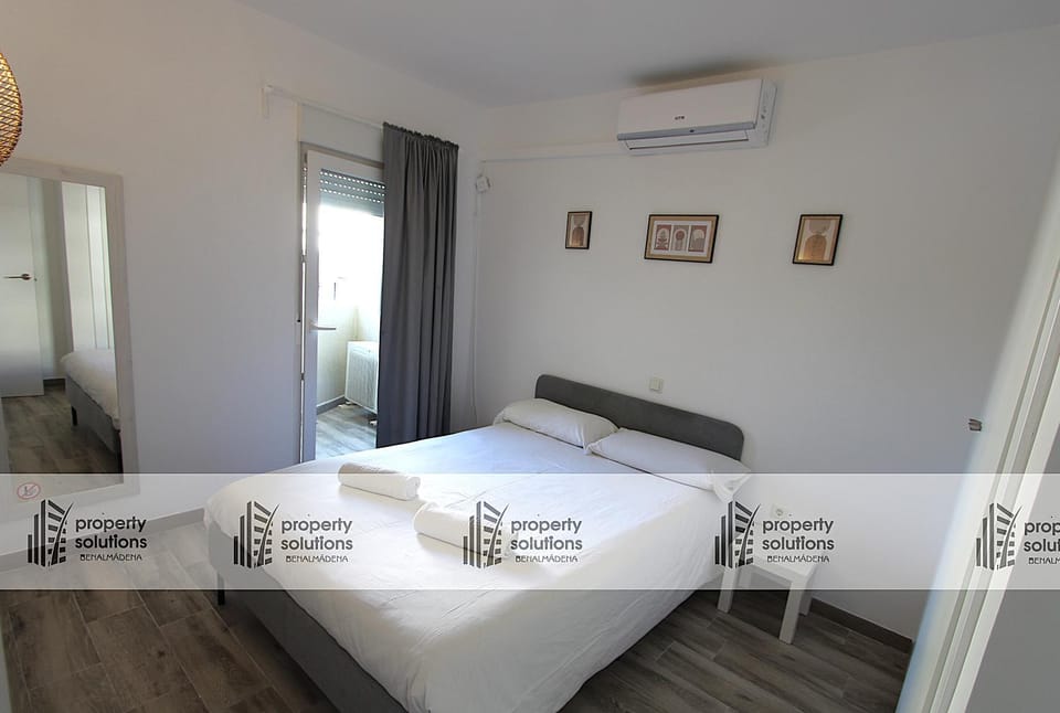 812 BENALBEACH. 1ºLinea de Playa. Vistas a la piscina y la montaña. Apartment in Benalmadena