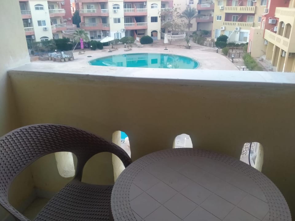 View (from property/room), Balcony/Terrace, Pool view, Swimming pool