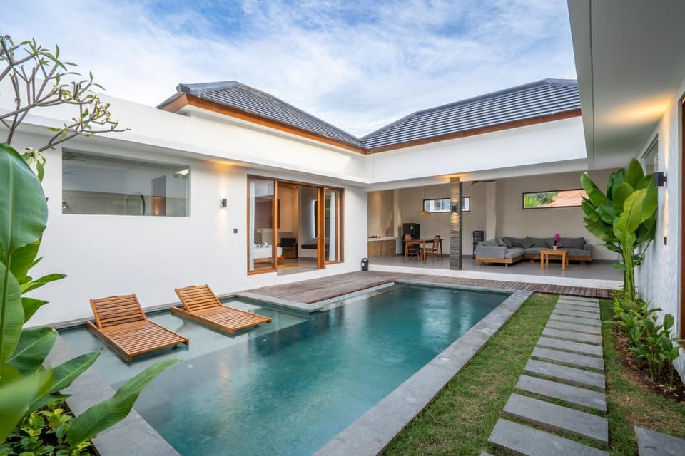 Property building, Patio, Living room, Seating area, Pool view, Swimming pool, sunbed