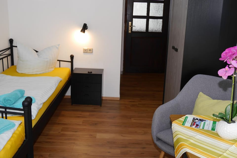 Bed, Seating area, Bedroom