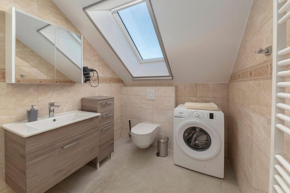 Toilet, Bathroom, towels, washing machine