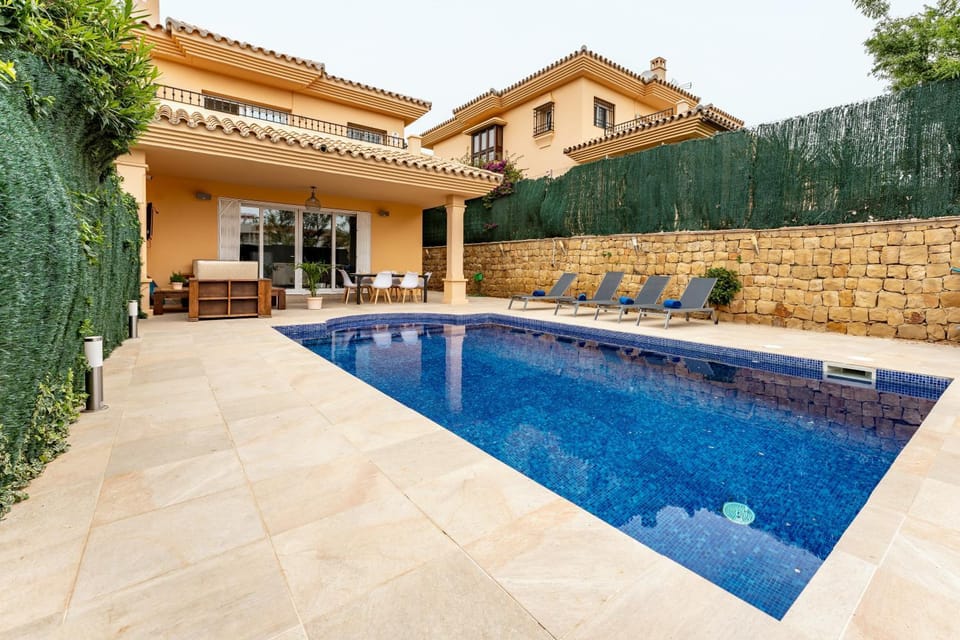 Property building, Living room, Swimming pool