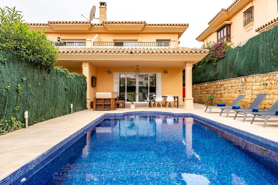 Property building, Living room, Swimming pool