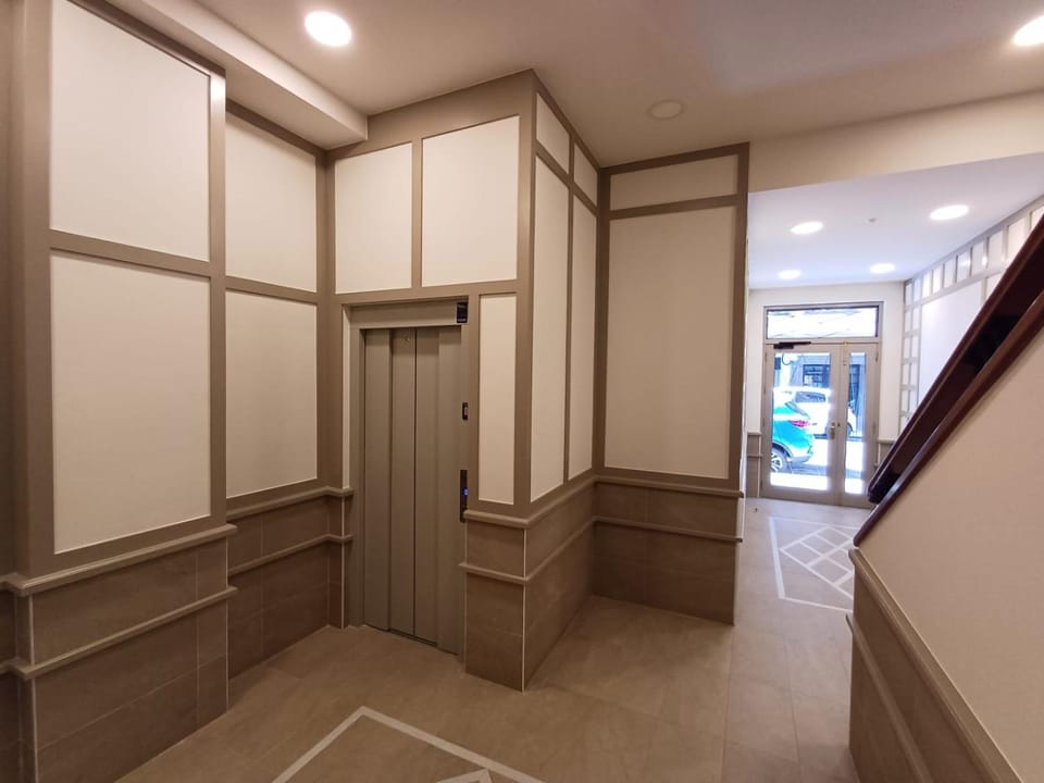 Property building, elevator