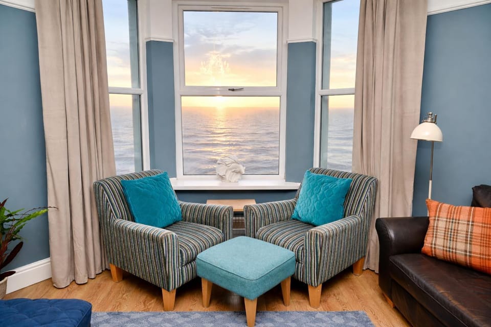 Natural landscape, Living room, Seating area, Sea view