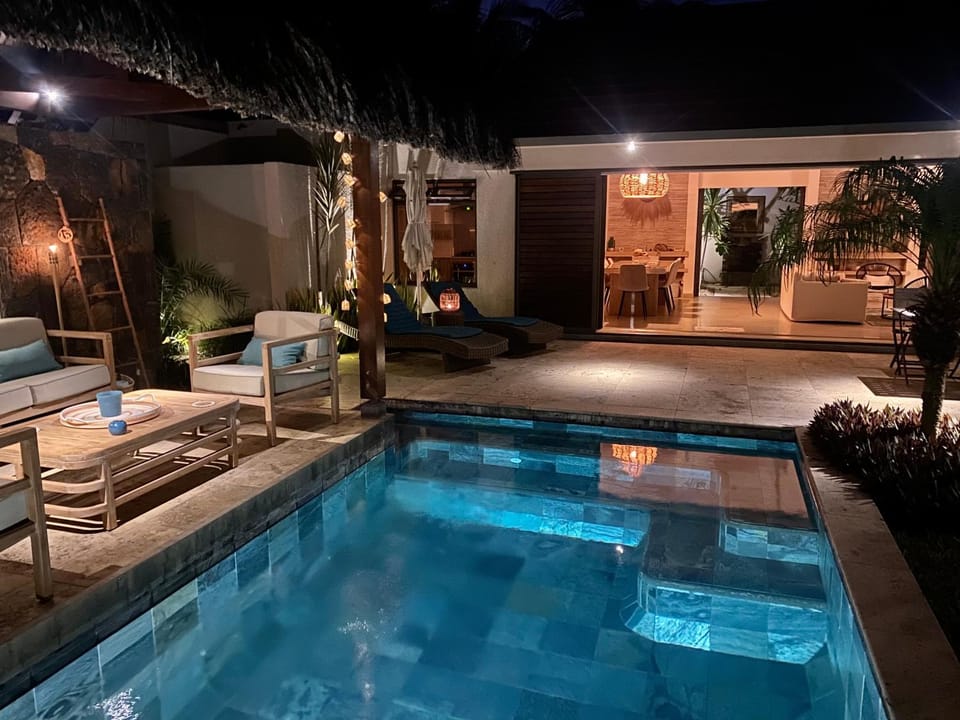 Patio, Night, Pool view, Swimming pool, sunbed