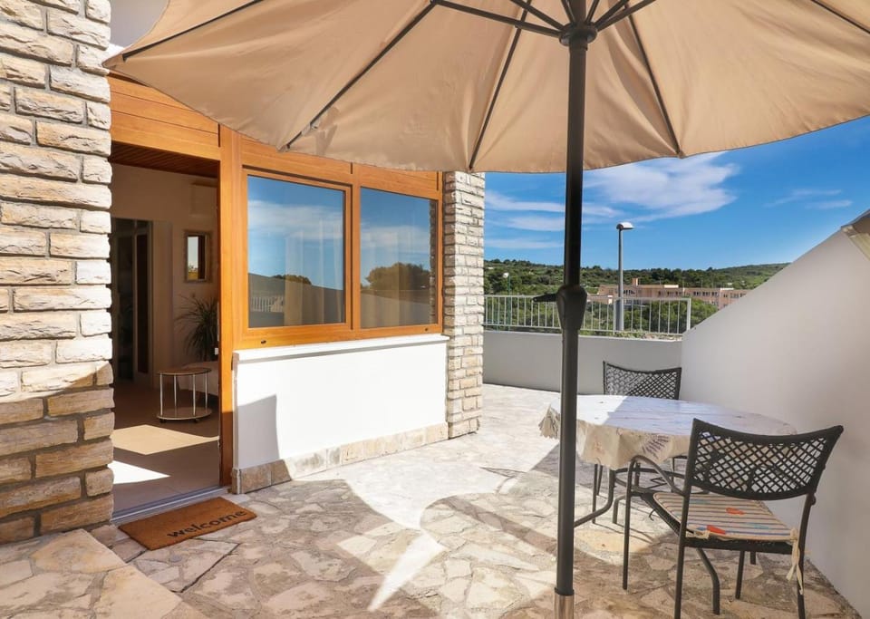 Apartment in Primosten with sea view, balcony, air conditioning, WiFi 5155-1 Apartment in Šibenik-Knin County, Croatia