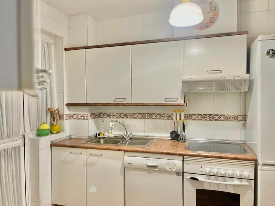 Kitchen or kitchenette, oven