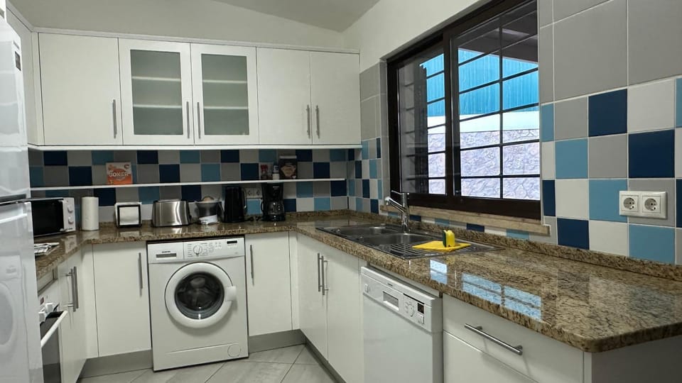 Kitchen or kitchenette, dishwasher, washing machine