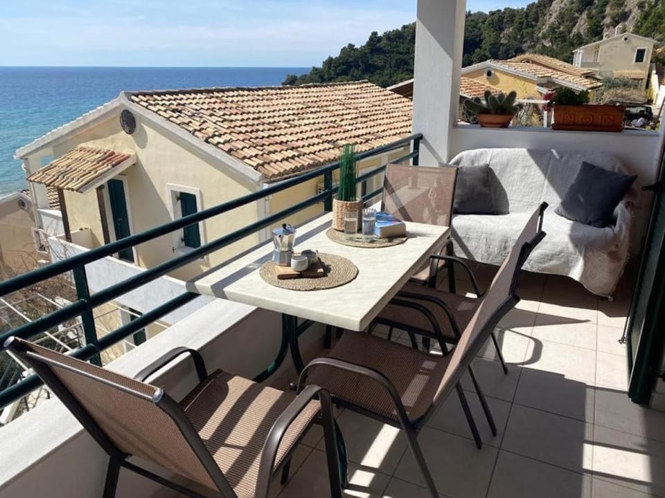 Day, Neighbourhood, View (from property/room), View (from property/room), Balcony/Terrace, Balcony/Terrace, Seating area, Dining area, Beach, Landmark view, Landmark view, Mountain view, Sea view, Sea view, Time of day, furniture