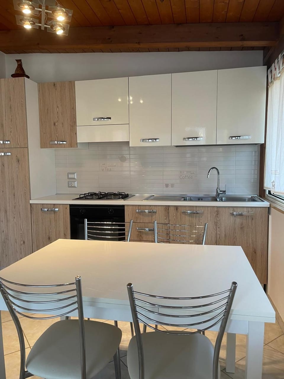 Kitchen or kitchenette, stove, kitchen