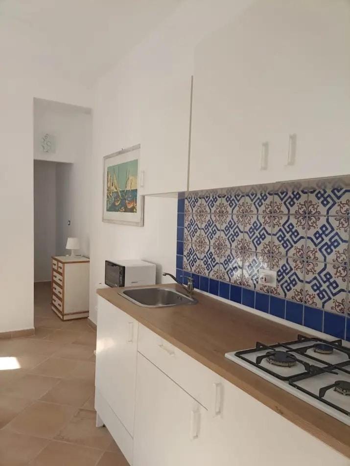 Kitchen or kitchenette, stove