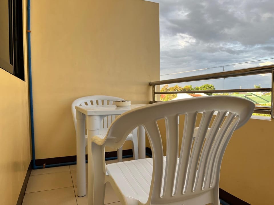 View (from property/room), Balcony/Terrace, Seating area, City view, City view, Sea view, Sea view