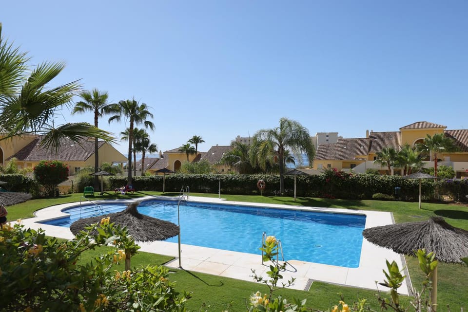 Property building, Living room, Swimming pool
