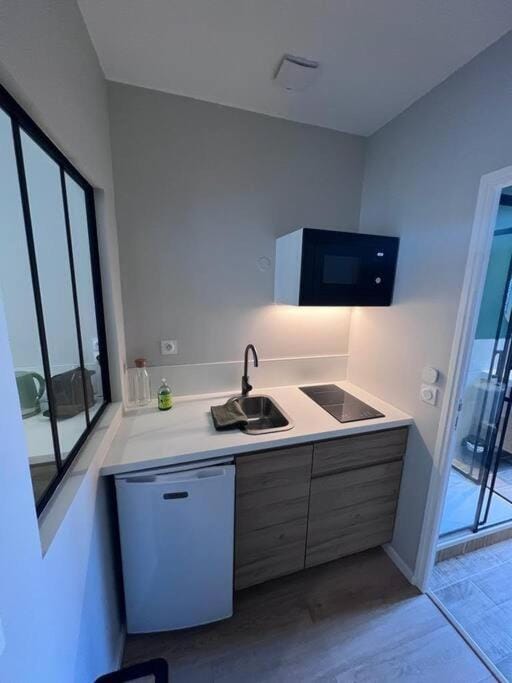 Kitchen or kitchenette, stove