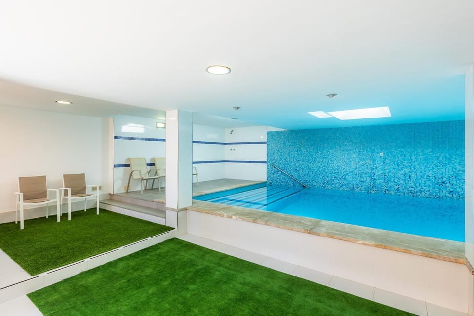 Property building, Living room, Swimming pool