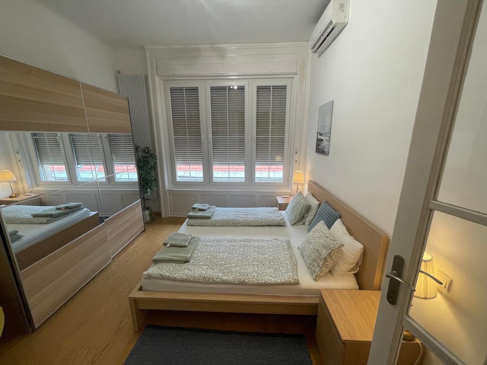 Bed, Photo of the whole room, Bedroom, towels, air conditioner