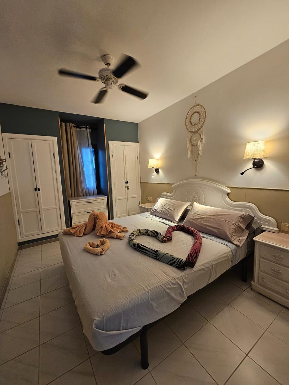 Bed, Photo of the whole room, Bedroom, fireplace, storage, towels, wardrobe