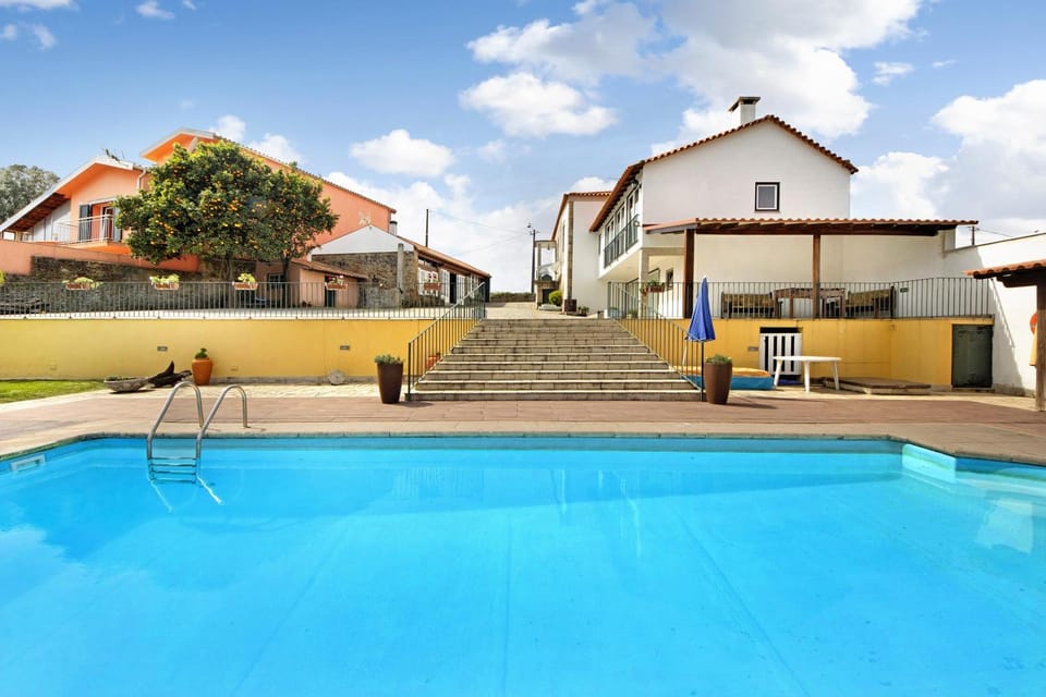 Property building, Living room, Swimming pool