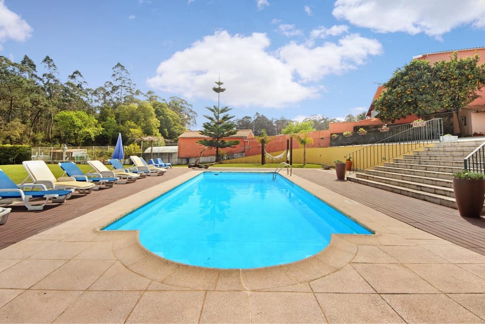 Property building, Living room, Swimming pool