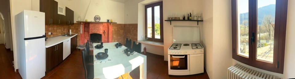 Kitchen or kitchenette, dishwasher, oven, stove