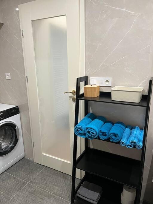 Bathroom, towels, washing machine