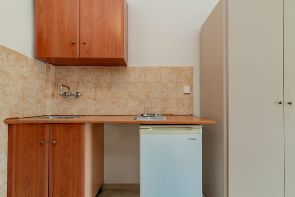Kitchen or kitchenette, stove, wardrobe