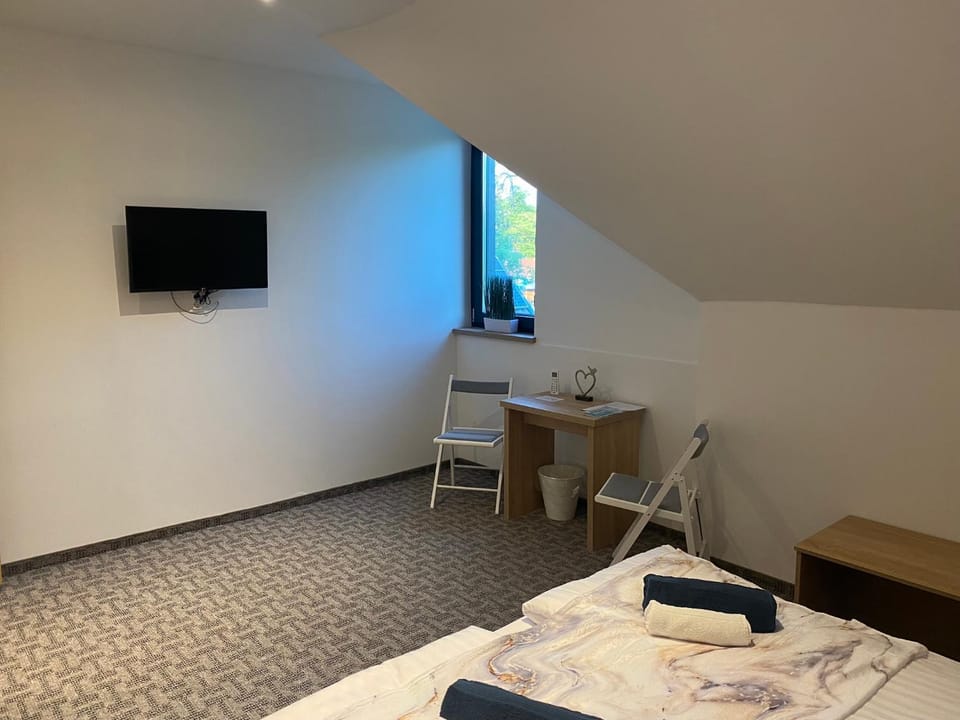 Bed, TV and multimedia, Seating area, Bedroom, hair dresser