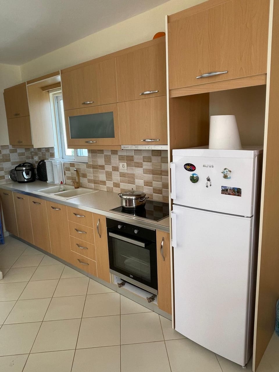 Kitchen or kitchenette, oven, stove