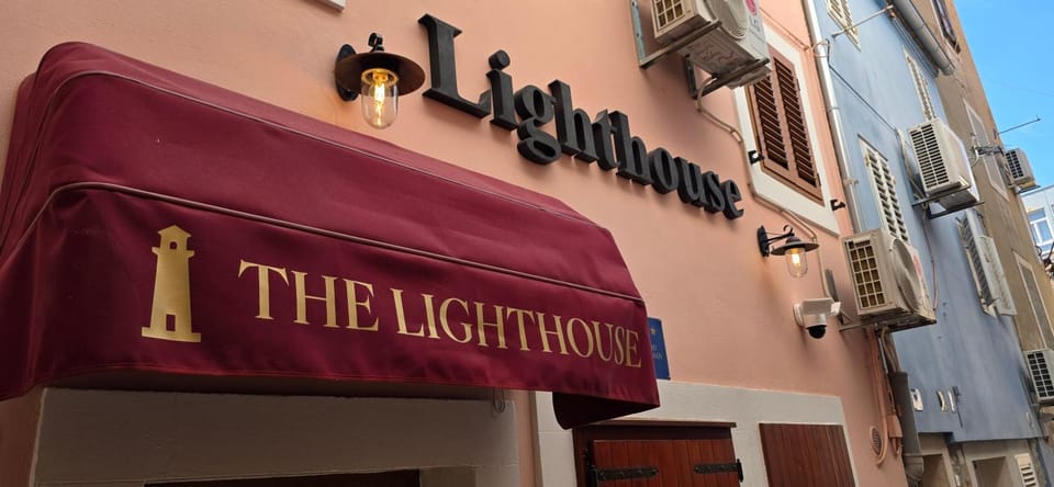 Property building, Day, Property logo or sign, Logo/Certificate/Sign, Street view, Certificate/Award