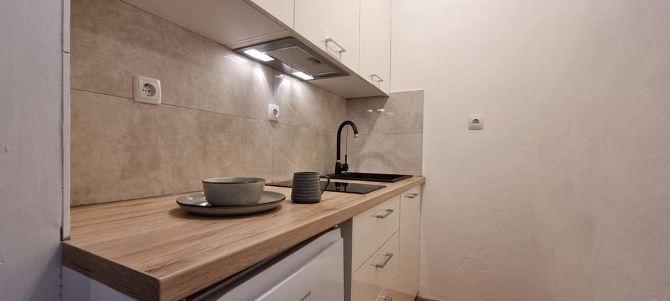 Kitchen or kitchenette, stove