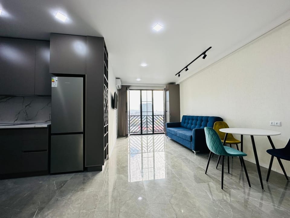 Kitchen or kitchenette, Living room, Seating area, Dining area