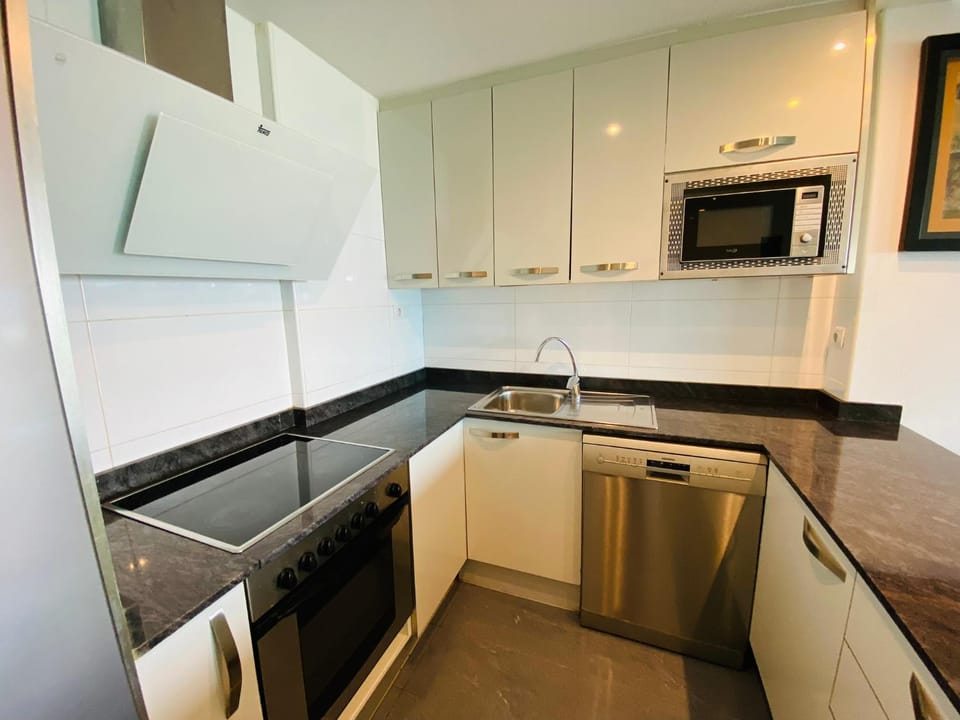 Kitchen or kitchenette, oven, stove