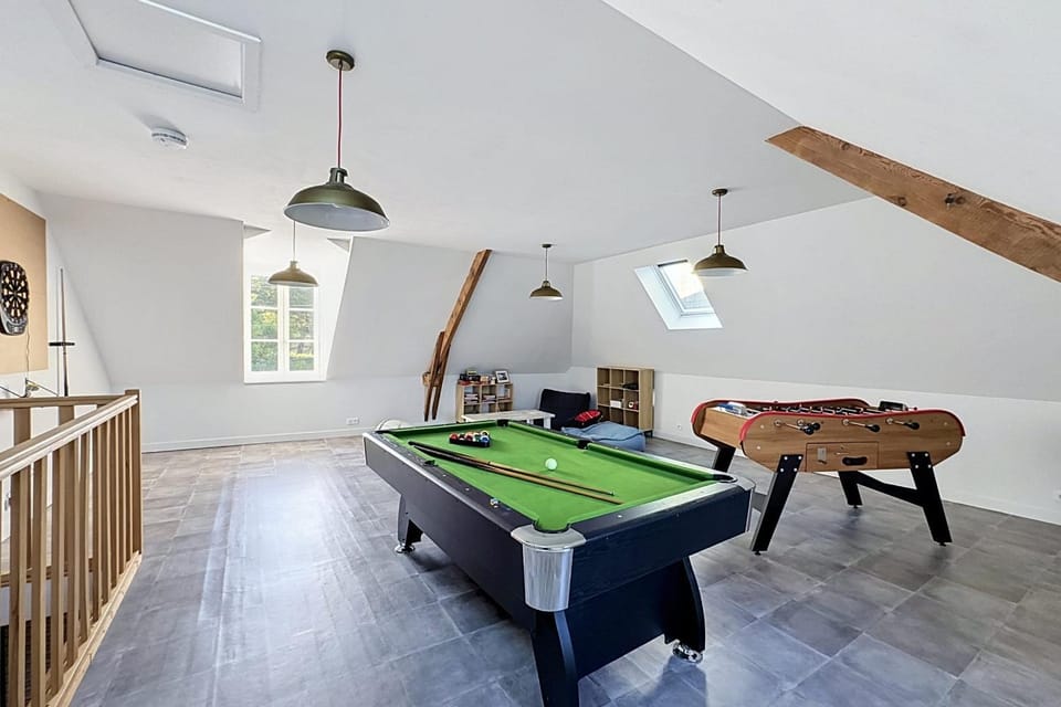 Maisons de Familles Beautiful city home with a pool table foosball table House in Normandy
