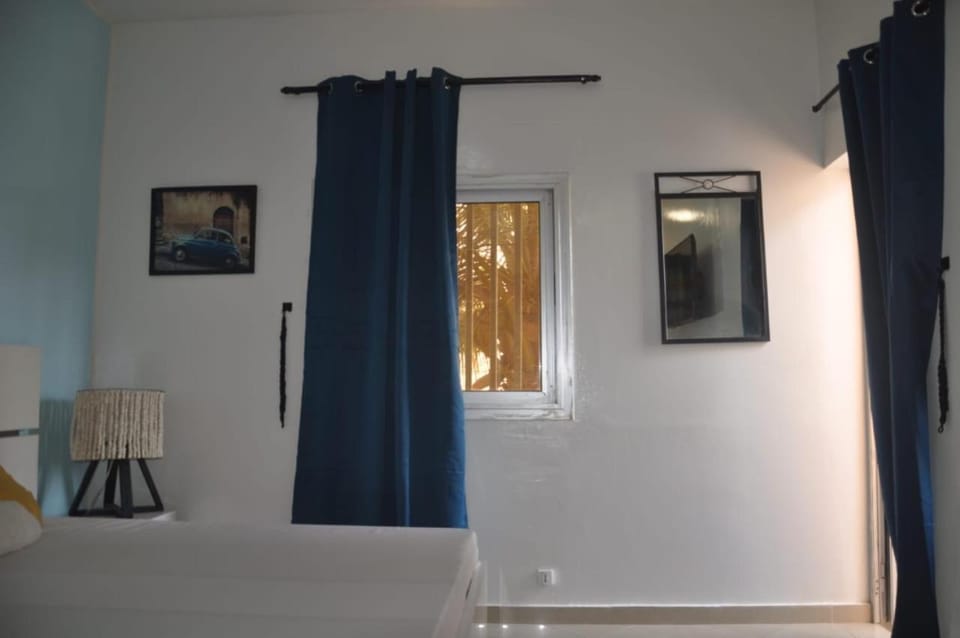 " Le Nid Douillet ", un fabuleux studio, calme, cosy et bien climatisé au centre de saly Apartment in Saly