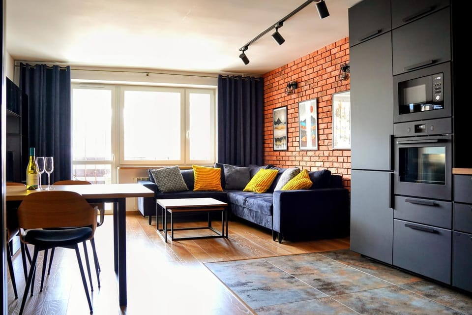 Kitchen or kitchenette, Living room, Seating area, Dining area