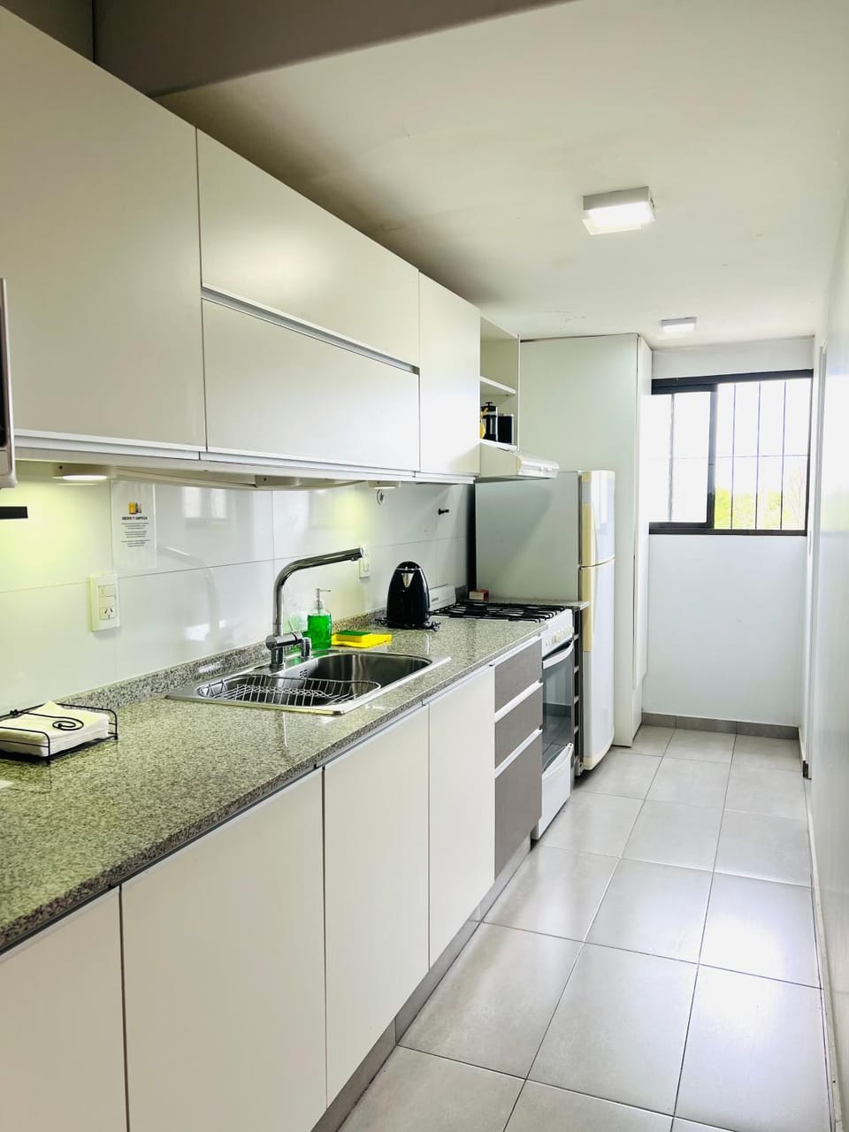 Kitchen or kitchenette, oven, stove, toaster